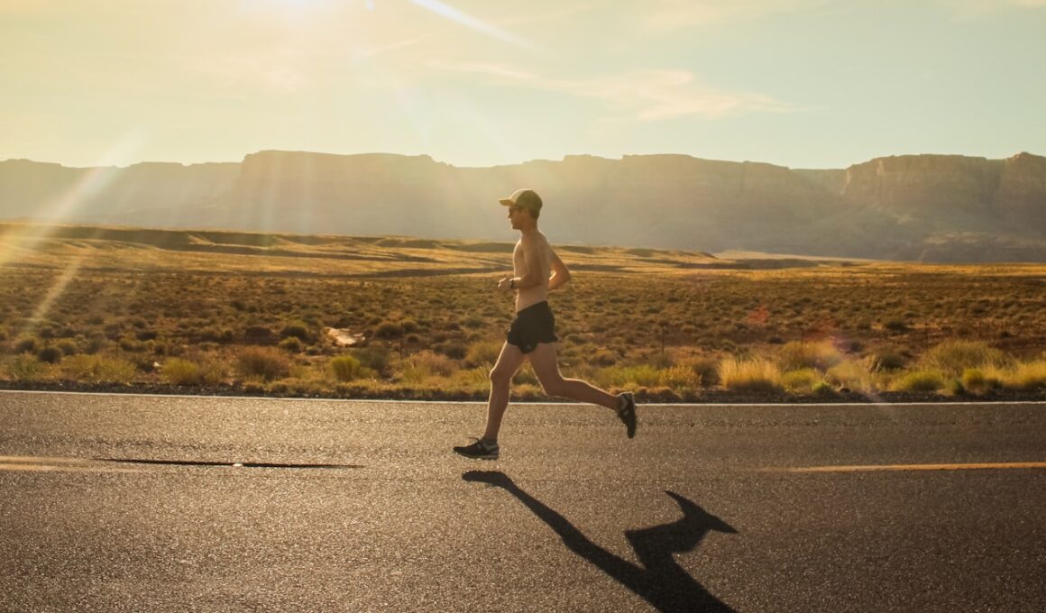 man in black shorts running on gray asphalt road during daytime